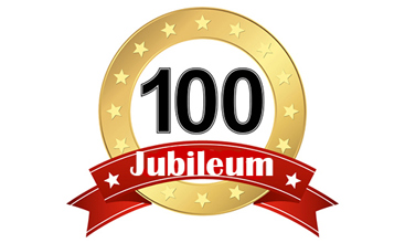 Et fartsskilt som viser påskriften 100, under skiltet står det jubileum. Foto: Mostphotos.com