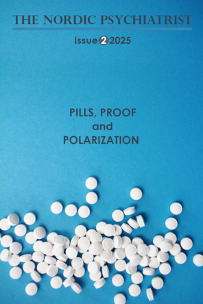 Blått magasincover med svart skrift og hvite tabletter.