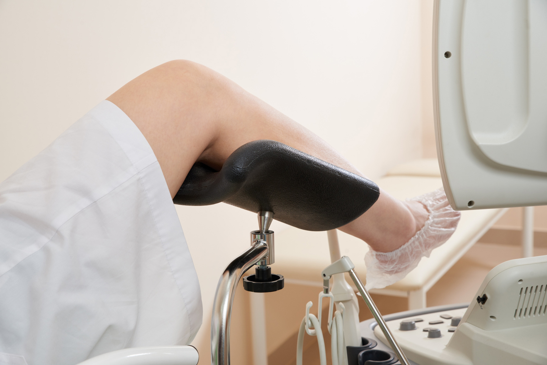 cropped-view-of-young-woman-sitting-in-gynecological-chair