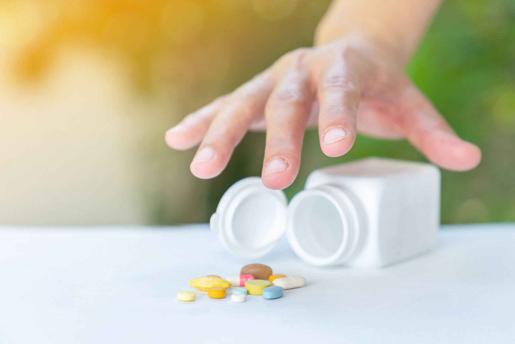 close-up-hand-pick-up-drug