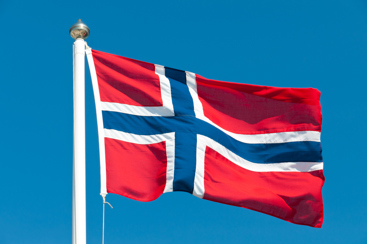 Norsk flagg. Foto: Istockphoto.com/Martin Wahlborg